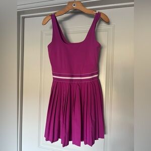 all in motion Sleeveless Pleated Midi Dress in Fuchsia with Waist Stripes